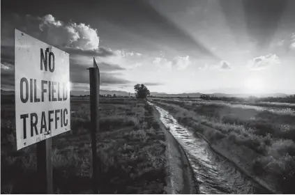  ?? Staff file photo ?? The fracking boom, combined with enormous windmill farms, threatens West Texas’ landscape and ecology. As more and more companies drill in the region, land stewardshi­p must be front and center in regional planning.