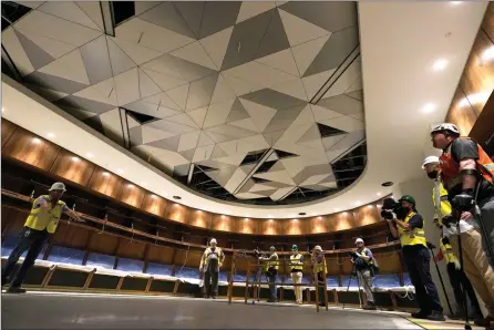  ?? The Associated Press ?? Visitors view the home lockerroom at Climate Pledge Arena during a media tour of the facility, Monday, in Seattle. The arena will be the home of the Seattle Kraken and the Seattle Storm women’s basketball team.