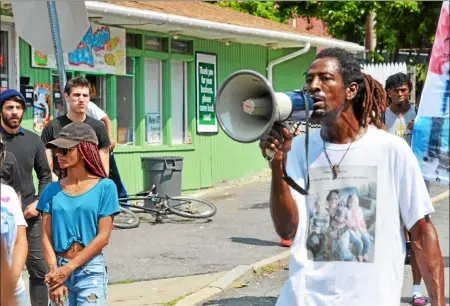  ?? NICHOLAS BUONANNO - MEDIANEWS GROUP FILE ?? Protest organizer Messiah Cooper speaks to the crowd after the march in 2017, Cooper is the uncle of Dahmeek J. McDonald, who was wanted and shot by police in the city.