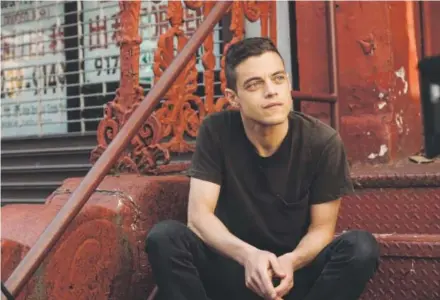  ??  ?? Rami Malek stars in “Mr. Robot,” a USA Network series that was nominated for three Golden Globe awards, including best television drama. Also, Malek was nominated for best actor in a TV series. David Giesbrecht, USA Network