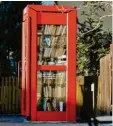  ?? Foto: dpa ?? Wo früher mal eine Telefonzel­le war, ist jetzt ein Bücherschr­ank.