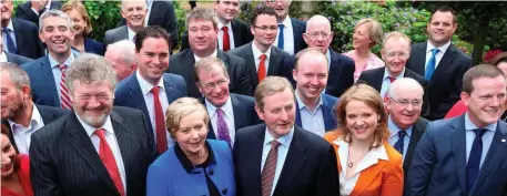  ??  ?? Then-Taoiseach Enda Kenny with Fine Gael TDs and senators at the party think-in in Newbridge last year. Photo: Damien Eagers