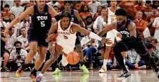  ?? Chris Covatta/Getty Images ?? Marcus Carr and Texas clawed back to beat TCU in January. The Longhorns head to Fort Worth for a Wednesday rematch still in the running for the Big 12 regular-season title.