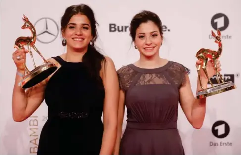  ?? (AFP/Getty) ?? Sarah Mardini and her sister Yusra, whose story inspired the fi l m ‘The Swimmers’