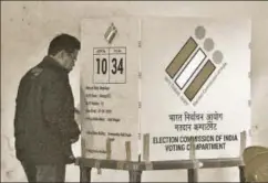  ?? AFP ?? A man prepares to cast his vote in Meghalaya. The first four general elections in the country were held simultaneo­usly with assemblies. This pattern was disturbed in 196869