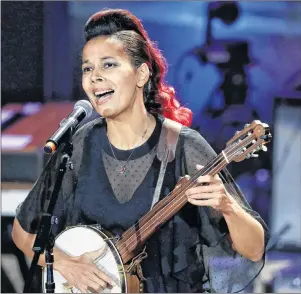  ?? AP PHOTO ?? In this Sept. 13 file photo, Rhiannon Giddens performs during the Americana Honors and Awards show in Nashville, Tenn. As a singer, songwriter and instrument­alist, Giddens crosses musical divides. The versatile 40-year-old performer is winning...