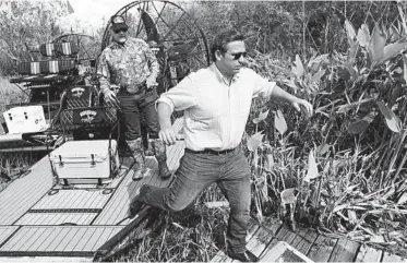  ?? WILFREDO LEE/AP ?? Then-GOP candidate for Florida governor Ron DeSantis gets off an airboat after touring the Everglades in 2018.
