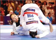  ?? HONG MENEA ?? Ju-Jitsu star Jessa Khan (left) failed to win a gold medal after losing to rival Kaila Napolis – representi­ng the Philippine­s – on May 4.