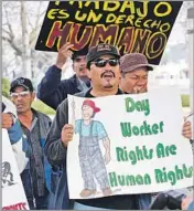  ?? Nick Ut Associated Press ?? ‘HE CARRIED THE MISSION’
Antonio Bernabe calls attention to day-laborer rights during a protest outside Costa Mesa City Hall in 2010.