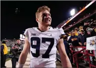  ?? JULIO CORTEZ - THE ASSOCIATED PRESS ?? Michigan defensive end Aidan Hutchinson reacts after a game against Maryland on Nov. 20in College Park, Md.