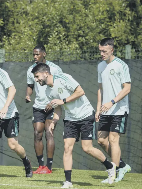  ??  ?? 2 New skipper Callum Mcgregor leads Celtic’s training session at Lennoxtown yesterday ahead of the Champions League qualifier against Danish club FC Midtjyllan­d at Celtic Park tonight