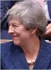  ??  ?? Grin: Mrs May yesterday