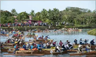  ??  ?? Racers compete in the 2019 Eco-Challenge adventure race in Fiji..