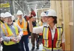  ?? Herald file photo ?? Premier Christy Clark visits Britco during a 2013 election campaign stop.