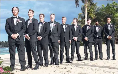  ??  ?? The groomsmen (from left): Jim Croffoot, Ryan White, Bruce Searby, Dan Searby, David Searby, Michael Gelpi, Brendan Murphy, Gautam Gatla and Brian Bailey.