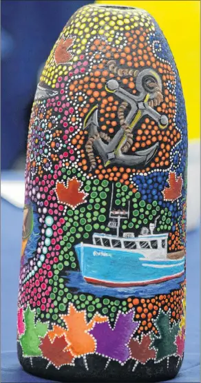  ?? KATHY JOHNSON PHOTOS ?? The artwork and detail on the buoy painted by Anne Lovitt that is in the Buoys of Barrington Art Show is nothing short of amazing.