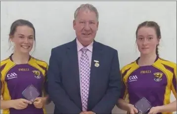  ??  ?? Handball President Joe Masterson with Under-17 runners-up Eva Crean and Cliodhna O’Connell.