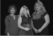  ??  ?? LEFT: ADDIE SWOPE (MIDDLE) POSES FOR a photo after being named K-3rd Grade Teacher of the Year. RIGHT: Cindy Marchant became Arizona Western College Part-Time Teacher of the Year.