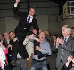  ??  ?? James Browne is feted by supporters after topping the poll in the Enniscorth­y district in 2014. He was elected to the Dáil in 2016 and Willie Kavanagh was co-opted to fill his vacant council seat.
