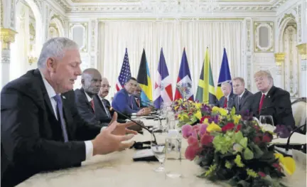  ?? (Photo: AP) ?? President Donald Trump (right) meets with Caribbean leaders at Mar-a Lago, recently, in Palm Beach, Florida. From left are St Lucia’s Prime Minister Allen Michael Chastanet, Haiti President Jovenel Moise, Dominican Republic President Danilo Medina, Jamaica’s Prime Minister Andrew Holness, and the Bahamas Prime Minister Hubert Minnis.