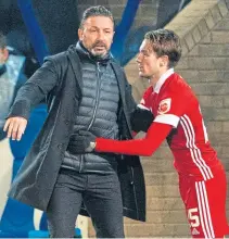  ??  ?? Derek Mcinnes might want to hold on to Scott Wright, but Robertson thinks it’s best the player heads for Ibrox now