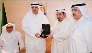  ??  ?? Sheikh Salman being awarded the first KOC medal.