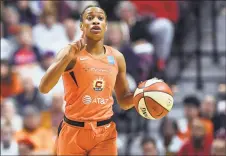  ?? Jessica Hill / AP ?? Connecticu­t Sun’s Jasmine Thomas brings the ball up court against the Washington Mystics during the first half in Game 3 of the WNBA Finals last season in Uncasville.