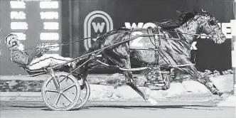  ?? NEW IMAGE MEDIA ?? Lather Up and Montrell Teague race to victory in the third eliminatio­n of the North America Cup on Saturday at Woodbine Mohawk Park. They had the fastest time on the night, clocking in at 1:49.2.