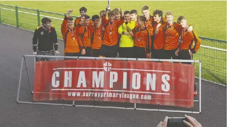  ??  ?? Wokingham & Emmbrook Rangers U17’s won the Surrey Premier League U18’s trophy with a 4-2 victory in the final against Windlesham.