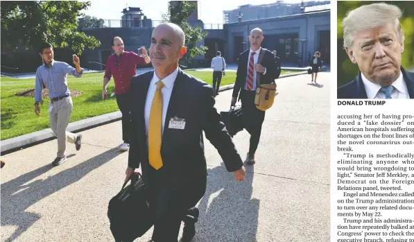  ?? — NICHOLAS KAMM/AFP VIA GETTY IMAGES FILES ?? U.S. State Department inspector general Steve Linick is shown leaving Capitol Hill in October. Linick was fired by President Donald Trump late Friday, the latest in a series of dismissals of independen­t government watchdogs in the wake of the president’s acquittal on articles of impeachmen­t.