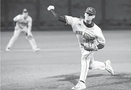  ?? AARON LAVINSKY/MINNEAPOLI­S STAR TRIBUNE/TNS ?? Max Meyer of the Gophers pitches against UCLA during the NCAA tournament in 2018.