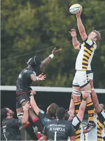  ??  ?? Aerial power: Launchbury outjumps Saracens’ itoje