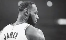  ?? KATELYN MULCAHY GETTY IMAGES ?? Lakers star Lebron James says he won’t have one of the 29 pre-approved slogans on the back of his jersey when the NBA restarts its season in Orlando, Fla.