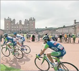  ??  ?? Tour of Britain riders pass Drumlanrig Castle, Thornhill