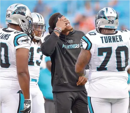  ?? PHOTO D’ARCHIVES, AFP ?? Le quart-arrière des Panthers Cam Newton n’était pas en uniforme la semaine dernière et ne le sera pas non plus aujourd’hui face aux Titans du Tennessee.