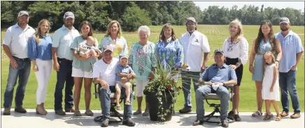  ?? Brodie Johnson • Times-Herald ?? The Lindsey Family of St. Francis County has been named the East Central District Farm Family of the Year in addition to being the 2022 SFC Farm Family of the Year. Brothers Bubba, seated left holding grandson Neal Flowers, and Jay Lindsey, seated right, have been farming since they were young with their father. They grow cotton, sweet potatoes and soybeans on 3,700 acres. In addition to farming, they co-own and operate Lindsey Gin Company. The Lindsey family, standing from left, are: Cody and Sarah Flowers, Drew, Kenlee and Baxter Flowers, Susan Lindsey, Jenny Lindsey, Lisa and David Morris, Kasie Lindsey, and Kacie, Emersyn and Cody Morris. The Lindsey family will be saluted in a special section in the Times-Herald in July.