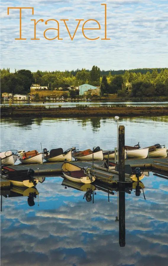  ?? Jill K. Robinson / Special to The Chronicle ?? Rowboats that take anglers out for earlymorni­ng fishing on
the Campbell River line the Tyee Club’s dock.