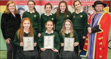  ??  ?? Students from St.Marys Secondary School, New Ross who were presented with Waterford Institute of Technology/BSTAI Junior Certificat­e Awards, for achieving an ‘A’ grade in their Junior Certificat­e Honours Business Studies.Standing from left: Eithne...