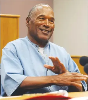  ?? The Associated Press ?? Former NFL football star O.J. Simpson attends his parole hearing at the Lovelock Correction­al Center in Lovelock, Nev., on Thursday. Simpson was granted parole after more than eight years in prison for a Las Vegas hotel heist. He will likely walk free...