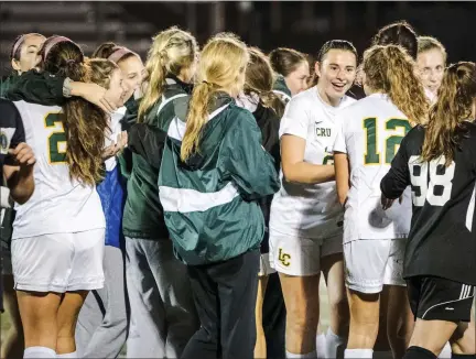  ?? MEDIANEWS GROUP PHOTO ?? Lansdale Catholic players celebrate their 1-0 victory over St. Basil Academy last season.