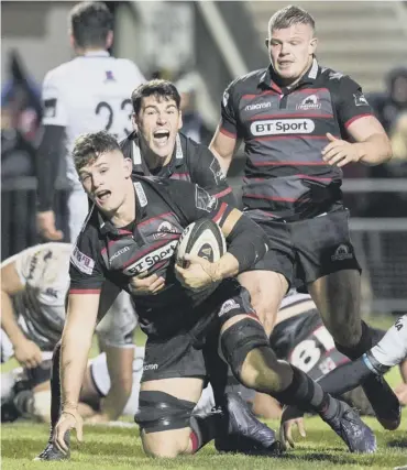  ??  ?? Edinburgh’s Magnus Bradbury scores the final try of the match, securing his team the bonus point.