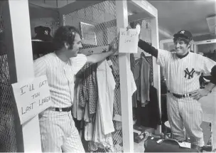  ?? LARRY C. MORRIS/THE NEW YORK TIMES ?? Mike Kekich, left, and Fritz Peterson in the New York Yankee’s locker room in New York on Sept. 17, 1971. Peterson, who was a stalwart pitcher for the ineffectua­l Yankees of the late 1960s and early 70s, but whose lingering renown derived more from one of baseball’s most notorious ‘trades’ — his exchange of wives with a teammate— has died. He was 82.