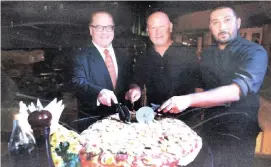  ??  ?? PIZZA SLICING-CEREMONY. Opening the foodfest were Marco Polo Plaza Cebu general manager Brian Connelly, with chefs Guiseppe Genco and Luca Genco.