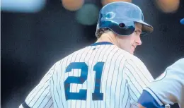  ?? DAVID LEEDS/GETTY ?? Paul O’Neill stands on a base as he looks on during a game between the Yankees and Royals on April 16, 2000, at Yankee Stadium.