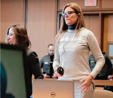  ?? Richard Harbus/Pool photo ?? Michelle Troconis listens to testimony on the sixth day of her trial in Stamford Superior Court, in Stamford on January 19.