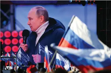  ?? ?? This 18 March 2022 photo shows Russian President Vladimir Putin on a screen as he delivers a speech during a concert marking the eighth anniversar­y of Russia’s annexation of Crimea, outside Luzhniki Stadium in Moscow, Russia. RIA/REUTERS
