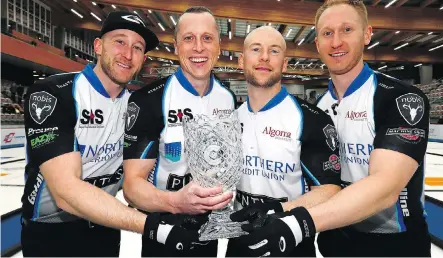  ?? DARREN MAKOWICHUK ?? The Jacobs rink, from left, Ryan Harden, E.J. Harden, Ryan Fry and Brad Jacobs, hold the Champions Cup after defeating Kevin Koe 6-2 in Sunday’s men’s final in Calgary.