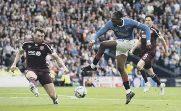  ?? ?? 0 John Souttar, one Hearts’ standout performers in the cup final, blocks a shot from Aribo