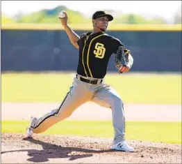  ?? HAYNE PALMOUR IV U-T ?? The Padres’ Luis Patino, shown in a workout last month, gave up three runs in one inning in his major league spring training debut against the Royals.