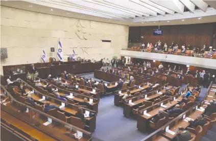  ?? (Alex Kolomyosky/Pool) ?? ONE MAJOR DIFFERENCE between Israel’s electoral system and that of most other Western democracie­s is the lack of any direct connection between the people who gain a seat in the Knesset and ordinary Israeli voters.